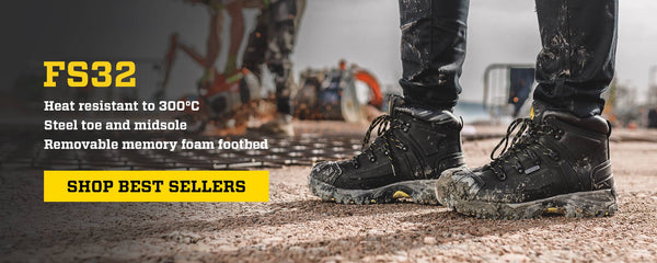 Amblers FS32 safety boots with text about heat resistance and features on a construction site background. Click to shop best sellers.